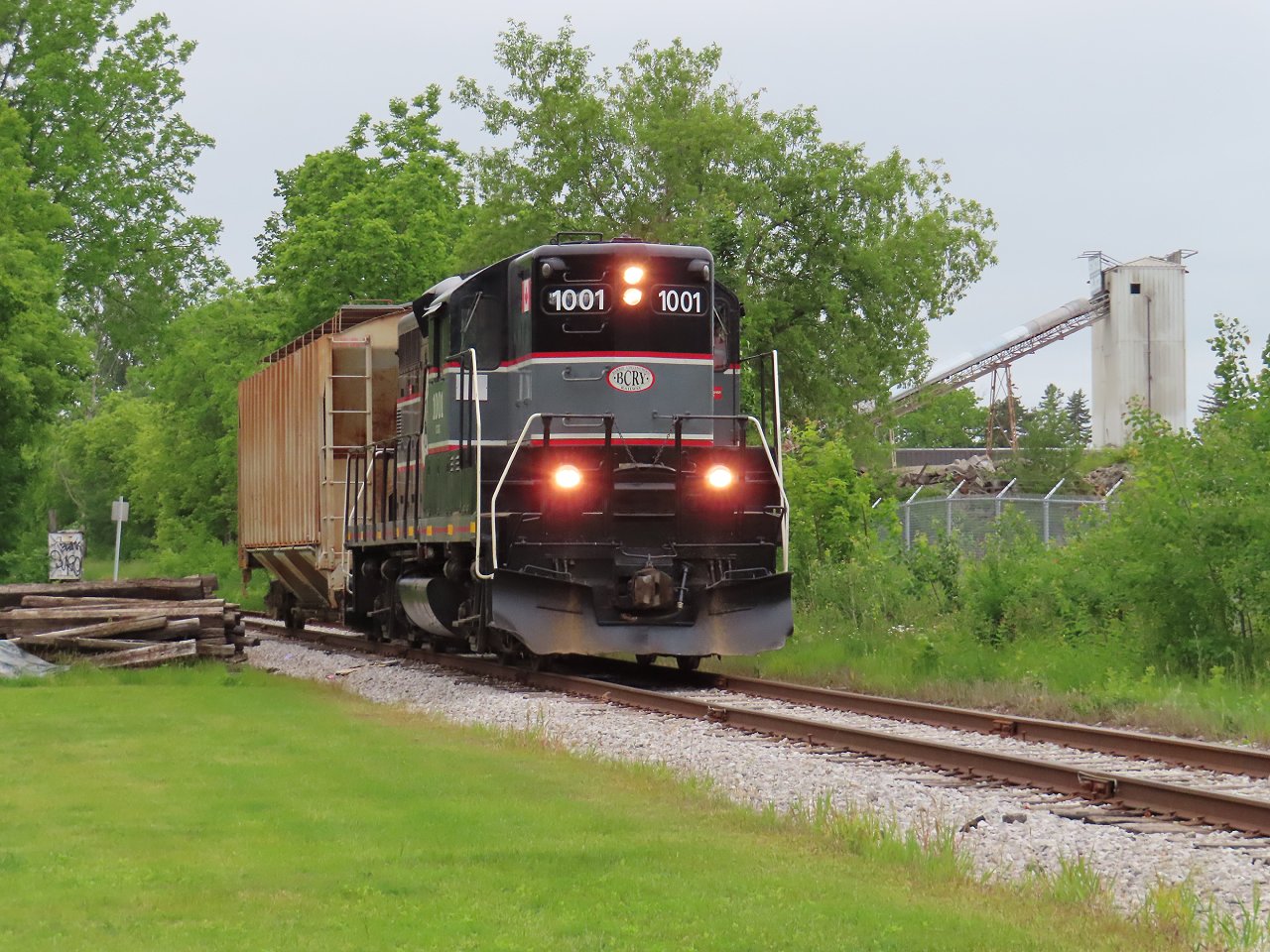 With one lone car, the Monday train heads east approaching Anne Street.