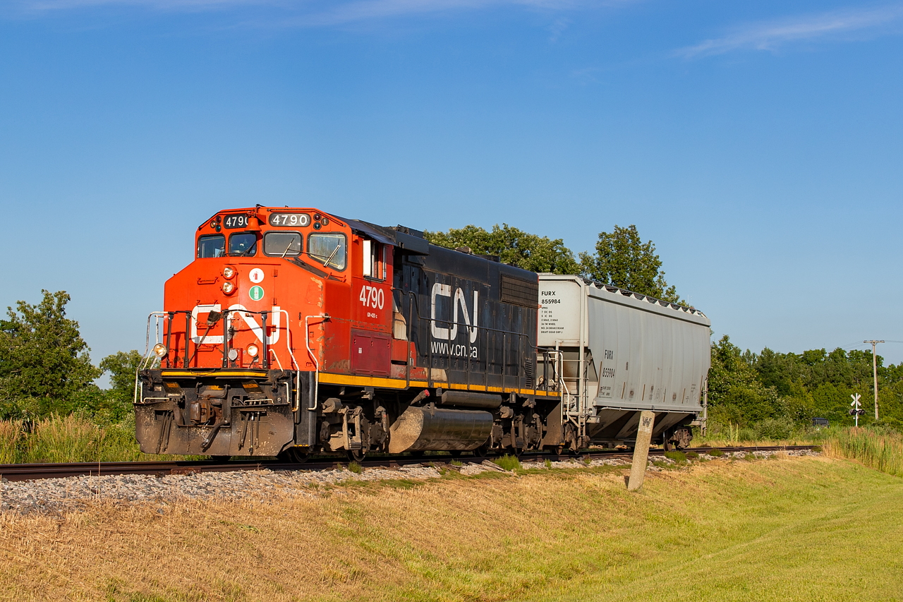 After spotting six empties at ADM, 514 heads out of Blenheim with their lift of one car, passing by some C&O remnants.