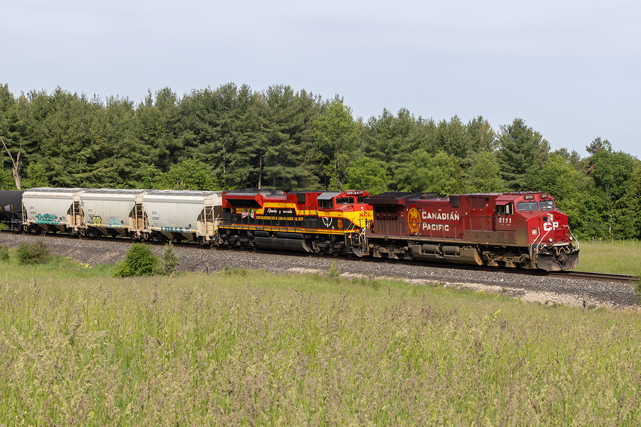 With smoke haze returning to Ontario, the much followed KCSM 4009 military tribute unit trails (sadly, that would have been asking a lot) on 134 east of Cambridge, Ont.