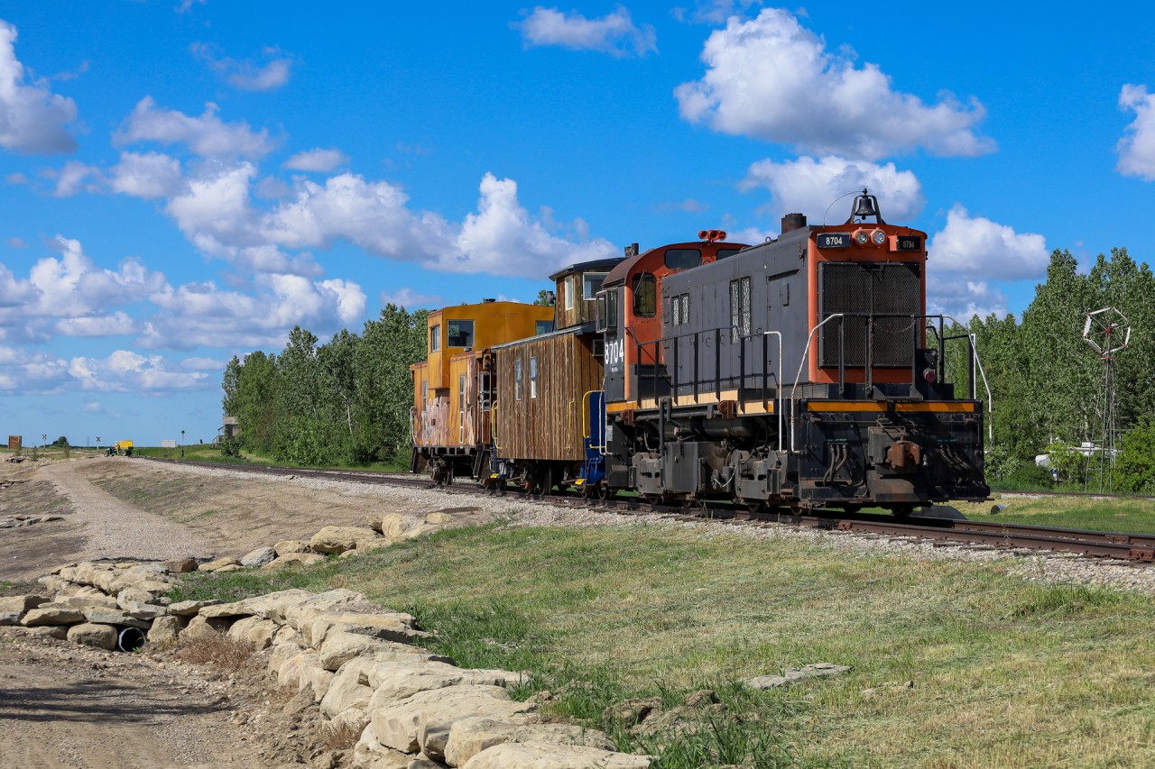 The Kidd Ranch excursion gets underway from Aspen Crossing with MLW 8704 and two cabooses.  Aspen Crossing is a campground in Mossleigh, Alberta - about an hour south east of Calgary, where you can stay in one of three cabooses and they operate excursions on the former CPR Lomond Sub.  Definitely a great spot to spend a few days!