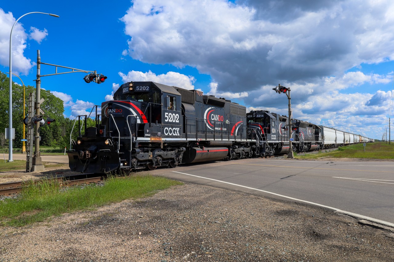 CCGX 5202, CCGX 4214 and CCGX 5206 rolls down the Fort Saskatchewan Spur, which is the former Vegreville Sub mainline prior to being routed around the city.   CCGX 5202 is an SD38AC and CCGX 5206, is an SD38