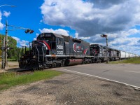 CCGX 5202, CCGX 4214 and CCGX 5206 rolls down the Fort Saskatchewan Spur, which is the former Vegreville Sub mainline prior to being routed around the city.   CCGX 5202 is an SD38AC and CCGX 5206, is an SD38