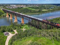 G 81451 28 rolls across the North Saskatchewan River with CN 2517 and BCOL 4642