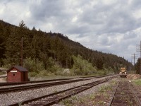 As a followup to the 1890s Keefers scene and detailed crops posted last week, here is how that area looked eighty years later, viewed eastward at the flagstop shelter, with the east end of the siding marked by the signal in the distance.

<p>This area was devastated by the Kookipi Creek wildfire in August 2023.

<p>When on track patrols there in 2007, the history of Keefers was “felt” all about, and just east of the east end of the siding, a chilling reminder of more recent history was the view across the river to a scar on the bank below CN’s Ashcroft sub. where a washout, derailment, and fire 1997-03-26 at Conrad ended the lives of conductor Donald Fink and engineman Terry Gallis on eastward freight train Q-102-51-26 powered by CN 5658 + 9546.

<p>See  https://tsb.gc.ca/eng/rapports-reports/rail/1997/r97v0063/r97v0063.html  for the TSB report on that CN incident.