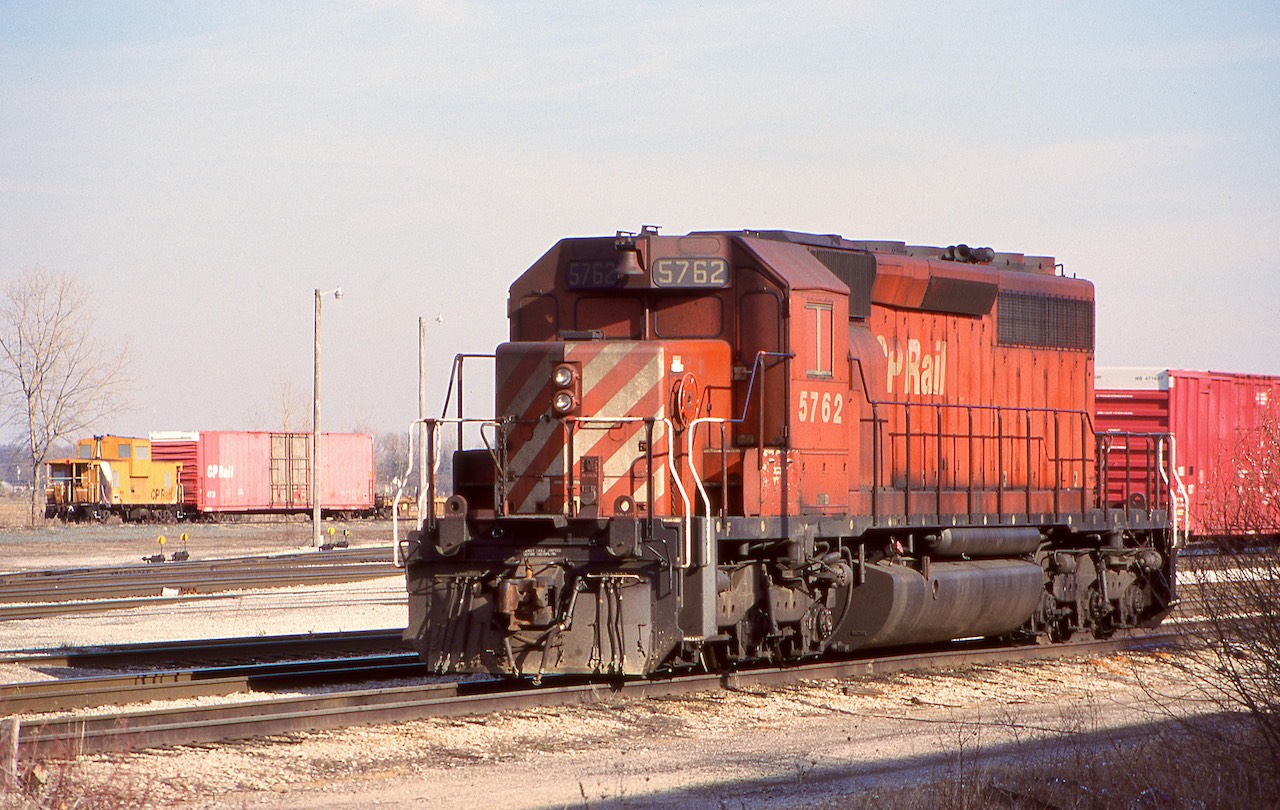 CP’s SD40 fleet was always interesting. I never really understood this group of SD40-2 “B”s and why they took perfectly good SD40’s and stripped the cabs, but it sure made for an interesting locomotive. I believe many of these were used as elves out west in coal service, which may have added a bit of clarity for the conversion but seems a fully usable locomotive would have been more practical. Then again I’m just a railfan, so what do I know. The Hamilton subdivision through the 2000’s was a good place to catch SD40 action and the climb up the Niagara Escarpment in both directions often meant several SD40’s on the head end of most trains. The converted “B” units were quite common here as well.  This day SD40-2 5762 shows off the exterior changes made to the “B” units as it lays over in the ex Canada Southern yard in Welland. All cab windows were painted out, and ditch lights and class lights removed. I don’t believe any of these conversions are left on the roster today.