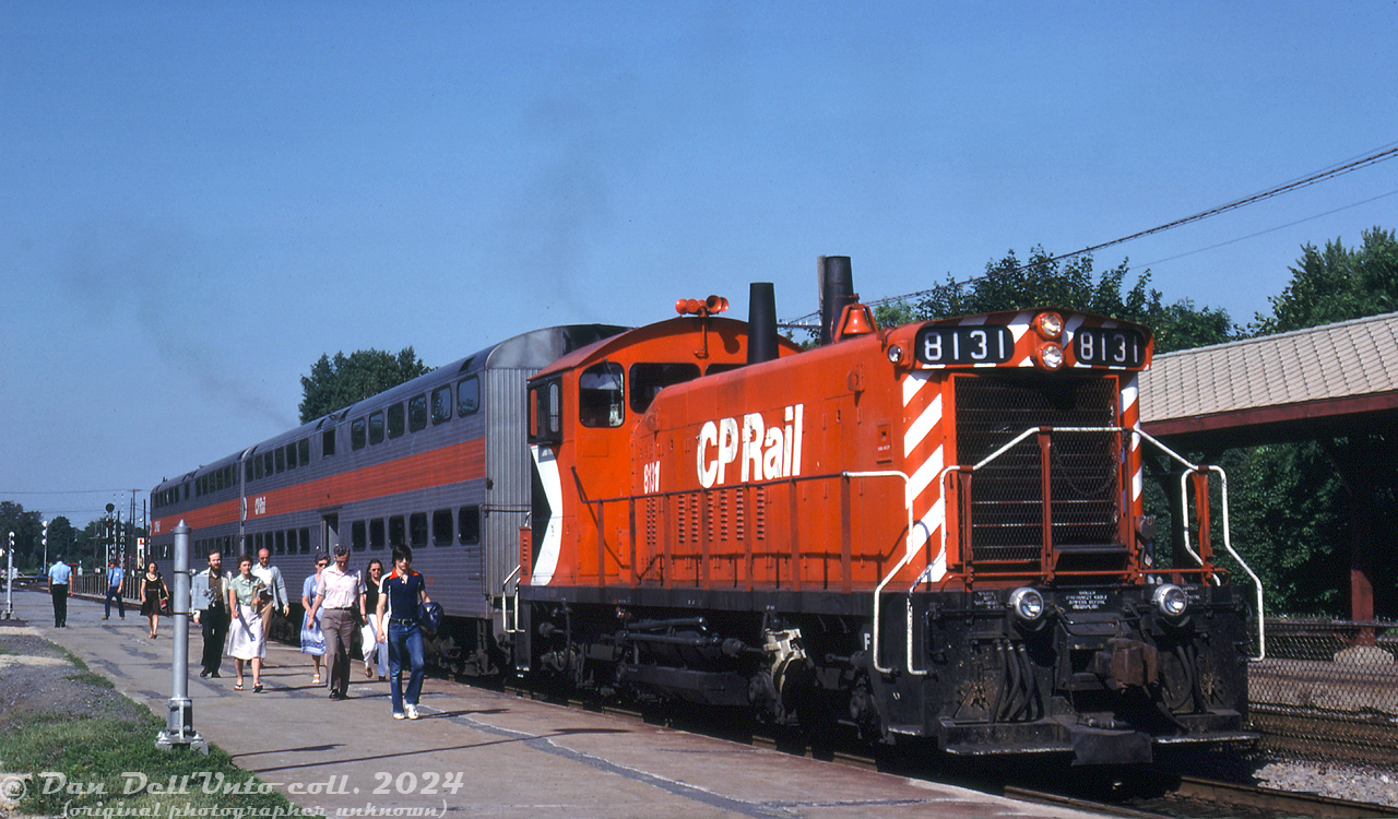 Not just for branchline work, the little GMD SW1200RS was a versatile model used in mainline freight, branchline, yard switching, hump, local, and even passenger service: CP 8131 is seen with two Canadian Vickers gallery cars on the "Yo-Yo" (the all-day back-and-forth Montreal commuter train) unloading at Montreal West Station. Typical consist was two cars with one unit was assigned, and often it was an SW1200RS. According to the late Bruce Chapman it was typically an 8131-8171 series unit equipped with 24RL brakes.

Many crews tended to prefer those 24RL equipped units over the earlier 6SL brake setups still on 8100-8130. According to Bruce, one time an earlier 8100-8130 series unit was assigned to that run, and the engineer (who was "a tad portly") had a fit about running it, as the larger 6SL brake handle setup interfered with his girth.

As part of the SW rebuild program, most of the upgraded SW1200RSu units in the 1200-series received modern 26LUM brakes.

Original photographer unknown (duplicate slide), Dan Dell'Unto collection slide.