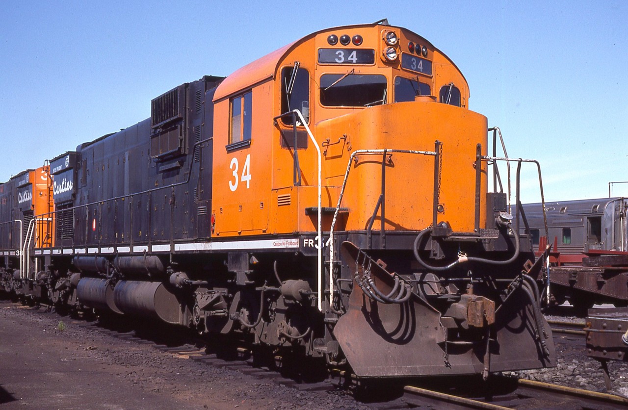 Out of the series of ALCO C-630 locomotives that once graced the Cartier Mining Co roster; this was the last survivor. The original series of #30-39 were all former UP locomotives, retired in 1990,  and according to the CTG this one might have been the former UP 2907. A perfect sunshine shot near the Port Cartier diesel shop back in ALCO glory days, this being early summer 1981.