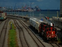 CN 500 has a one day only lashup of CN 7272 & CN 4140 as it leaves the Port of Montreal with four hoppers.