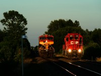 Sunset is about 45 minutes away as CPKC 121's outbound crew is setting CP 3015 off at the yard in Farnham. KCS 4794 at left is the leader and will soon back up to its train before it departs for Montreal.