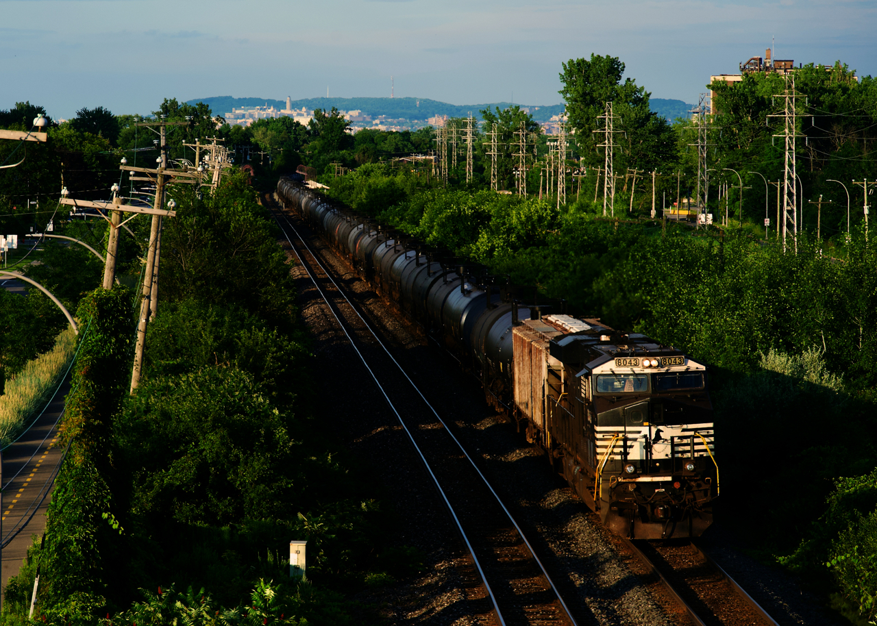 An NS ES44AC brings up the rear of ethanol train CPKC 528.