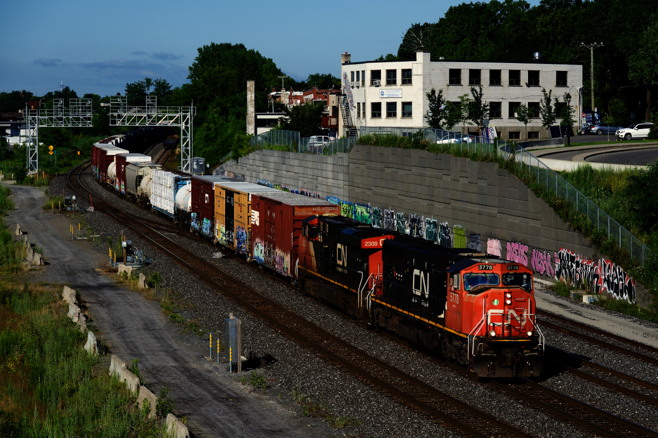 CN 324 is heading to Vermont with CN 5778, CN 2309 and 55 cars.