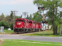 A trio of ECO units proceeds west slowly through Peterborough crossing Aylmer Street. When I was a Kid growing up here this train ran at night. Back then the power was usually a mix of four axle power, GP-35's C424's or RS-18's. One time a C&O GP-30 showed up. Back then my brother was the camera guy and film was expensive. As teenagers there were other pursuits, so there aren't any photos from those days.