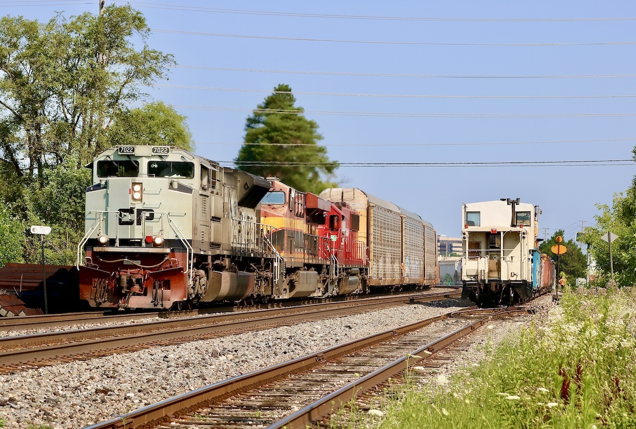 There has been a decent variety of SD70ACU’s around lately meaning some trains are a bit more worthy of going out for. Hearing this train was just clear of Guelph Junction pushed me to make a quick, extended coffee run before having to head back home. Thankfully the sun in the summer takes a bit longer here to cross the tracks near Streetsville yard. We almost got blocked out by the tie train, which cleared a couple minutes earlier adding a clean CP van to the shot as CP 134 entered the scene with military 7022, KCS and CP ex SOO SD60 6255 in the mix.