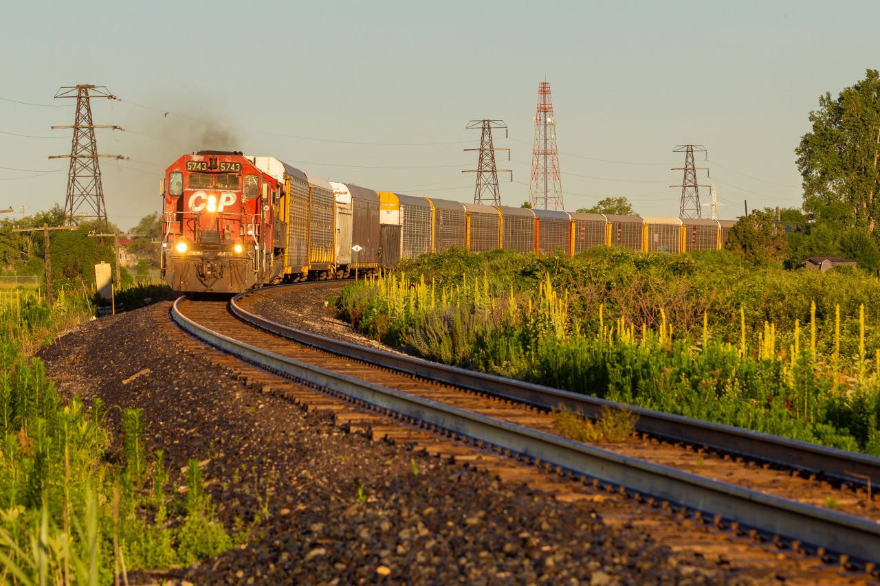 Unbelievable could be one of many words said about this years Canada day. After spending almost a whole day trying to track 5743's moves in Windsor the day before and trying to figure the reason why they were being unpredictable, I decided at the end of the day that the chances of the famous SD40-2 leading an eastbound would be slim to none, especially in shootable lighting. Still, I decided to wake up at 5:30 am to turn on my scanner for some hope. Only 30 minutes after, and being half sleep, I heard the crew of 134/2-H89 call themselves CP 5743 East. Safe to say I was immediately was no longer half-asleep...
The chase began with me running out of my house at 6 am in the morning, and chased him to my first spot; here at the Tilbury curve. Something you could literally dream about in a railfans mind; waiting out in the country with the early morning birds chirping, hearing a horn in the distance, with a SD40 rounding the curve. The weather couldn't of been more perfect today, and I do not think I could ever have this experience with a SD40 ever again...