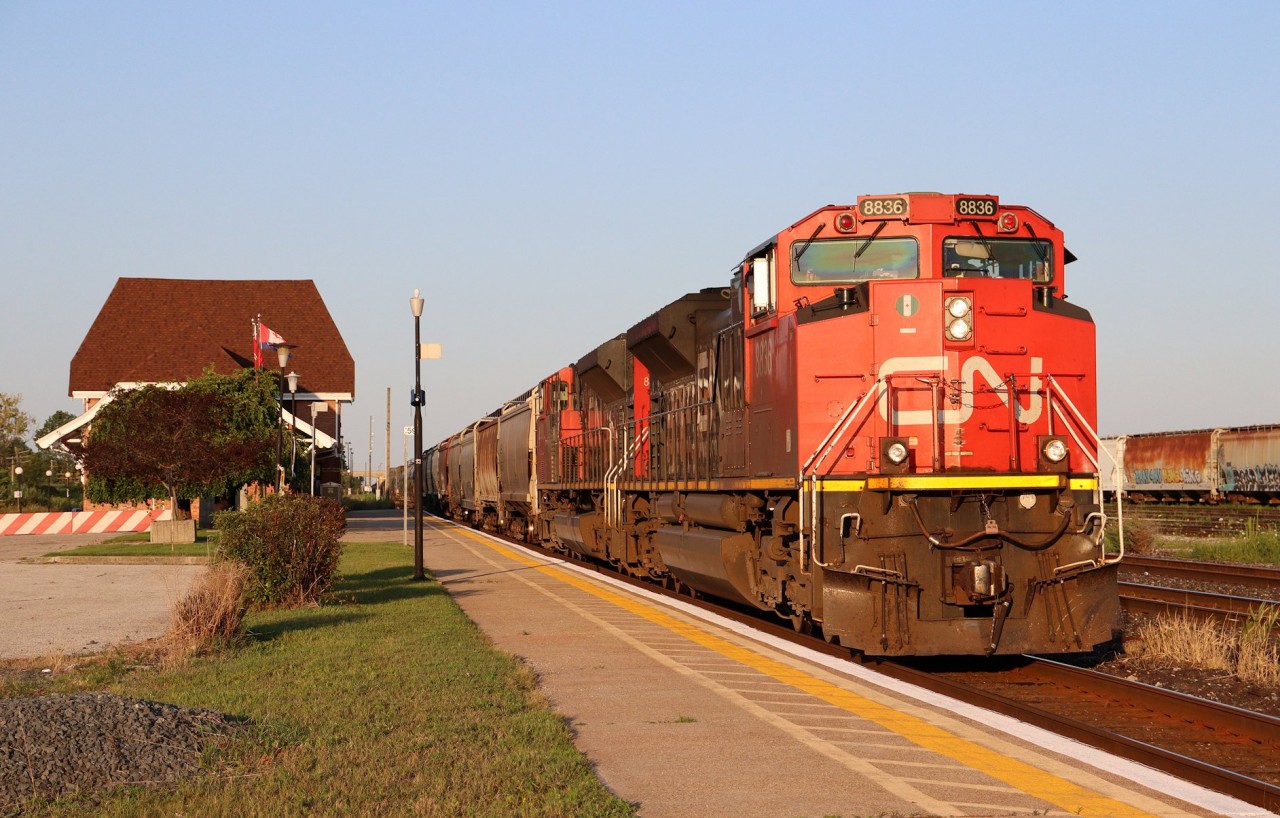 CN 8836 leads train M301 out of Sarnia heading for the international rail tunnel to Port Huron, Michigan in the evening sun.