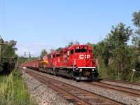 Well the long overdue ballast train finally headed out today to dump ballast along the Galt sub. They had finished dumping by the time they hit Twiss Road in Campbellville. Flying by are SD40-2, CP 6011 all decked out in a new paint job, SD30C-ECO, CP 5029 and SD40-3, KCS 3137. The former CN 5117 was sold to KCS in 1998 and rebuilt in to its current KCS 3137 SD40-3 style. The trio would wye their train at Guelph Junction and head back east to Lambton.
