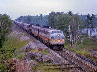 While servicing is taking place on CNR 6167 at nearby CN South Parry, the turnaround point on todays excursion, CPR 12, the Sudbury - Toronto section of the <i>Canadian</i>, cruises south past a few photographers.

<br><br>I had been working the lunch counter on this UCRS excursion, and had the opportunity to get the following shots throughout the trip:
<br><a href=https://www.railpictures.ca/?attachment_id=52540>Northbound over the Trent-Severn Waterway at Washago</a>
<br><a href=https://www.railpictures.ca/?attachment_id=52654>Southbound over the Trent-Severn Waterway at Hyro Glen</a>


<br><br>Scan and editing by Jacob Patterson.</i>
