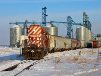 The resident switcher at the Providence Grain Gaudin elevator, located off CN's Vegreville Sub just east of Scotford is Northern Plains Rail Services SD40-2 NPR 5906. (ex CP 5906).  Seen here moving cars through the loading track.