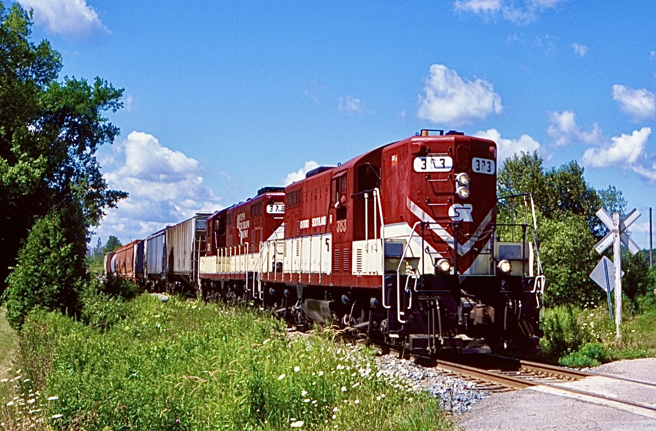 Ive always had a fascination with this pair of locomotives. Back in the early 2000’s I remember picking up an issue of CTC Board magazine with a two page spread at the back dedicated to these two units when they were in full SOO Line paint. I never could have imagined back then that these two units would end up so close to home. After their arrival I devoted a lot of time chasing down the SOO sister 7’s. From Clarkson to Guelph Junction and later Salford. I miss seeing this pair out on the road as they typically these days call the shop at Salford home and only see action as backup power when other chop nose units are not available.  This day the sisters were out on a run to the potash facility in Putnum. Here they are seen on their return trip to Ingersol  where they will collect the rest of their train and head for the CP interchange at Woodstock.