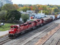 I've gotten lost in 2020. for 7 weeks, London Buffalo 254-255 had the "Triplets".....3 standard cab GM's careening back and forth on the Galt and Hamilton Subs. Figuring I would never see anything like this again(I haven't to date), I did everything I could to catch them in as many places as possible. 

Sure the sun is in the wrong place, but the colours are starting to pop as this wonderful, unintended I suspect, tribute to history rolls through Galt.