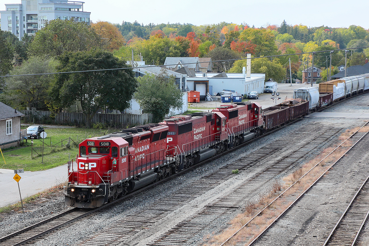 I've gotten lost in 2020. for 7 weeks, London Buffalo 254-255 had the "Triplets".....3 standard cab GM's careening back and forth on the Galt and Hamilton Subs. Figuring I would never see anything like this again(I haven't to date), I did everything I could to catch them in as many places as possible. 

Sure the sun is in the wrong place, but the colours are starting to pop as this wonderful, unintended I suspect, tribute to history rolls through Galt.