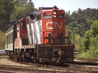 Early days of VIA....this appears to be just an ordinary CN passenger train, but slowly some equipment was receiving the new blue and gold colours.
CN 4101 is seen in a tight view just about to enter the Oakville Sub at Bayview Jct in what appears to be early afternoon setting. 
The 4101 eventually was dealt off to the Pioneer Rail Corporation in 2003.