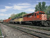 An eastbound CP intermodal train is observed waiting for a new crew at Quebec Street yard in London, Ontario. The train was powered by CP SD40-2 5657, HLCX SD40 4060 and HATX GP40-2 510. Depending on crew availability some crew changes occurred in a timely manner while other trains would sit for much longer waiting.  
<br>
HLCX SD40 4060 was built in 1970 as Missouri Pacific 760, prior to becoming Union Pacific 4060. HATX 510 was manufactured during 1977 as Boston and Maine 304. Later it would be rebuilt to become Ontario Northland Railway GP40-2 2202. 
