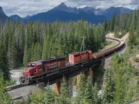 CP 5792 and CP 5871 lead an empty ballast train at Ottertail.