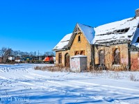 CN 148 with CN 2866 and ex CSX Dash 8 GECX 9147, slows to a crawl to protect the Thames Street crossing. In the foreground, the old Ingersoll station whose roof was barely intact on this visit in 2017. It would continue to rot, fatigue and eventually fail. On December 8, 2020 a pair of excavators were called in to demolish the century old building. 