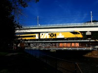 VIA 22 with the specially painted 'Lumi' trainset is crossing the Lachine Canal. It entered revenue service last week.