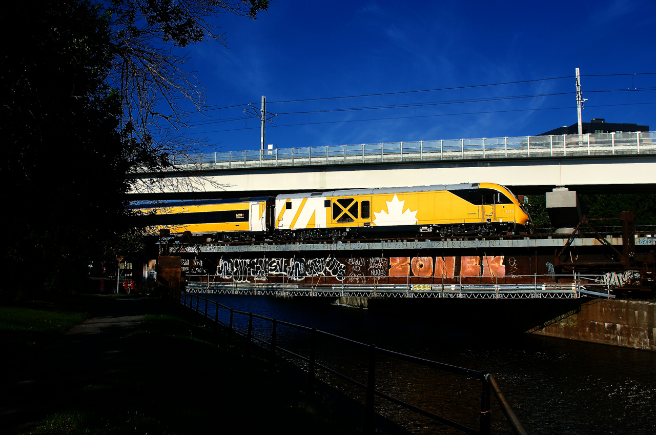 VIA 22 with the specially painted 'Lumi' trainset is crossing the Lachine Canal. It entered revenue service last week.