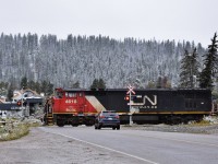 <br>
<br>
 Northward view along Hazel Ave – west end CN Jasper yard.
<br>
<br>
 CN 4618 (DASH 8-40CMu)  is ex BCR 4618 acquired July 2004 and CN 2902 ( ES44AC) switching at Jasper.
<br>
<br>
 September 12, 2018 digital by S.Danko at Jasper.
<br>
<br>
  Noteworthy:
<br>
<br>
   In the background: during the evening of July 25, 2024 all those structures were destroyed.
<br>
<br>
Sdfourty. 
