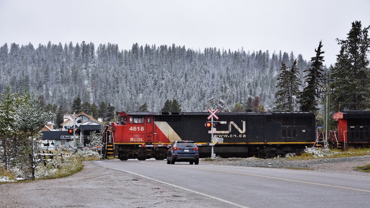 Northward view along Hazel Ave – west end CN Jasper yard.


 CN 4618 (DASH 8-40CMu)  is ex BCR 4618 acquired July 2004 and CN 2902 ( ES44AC) switching at Jasper.


 September 12, 2018 digital by S.Danko at Jasper.


  Noteworthy:


   In the background: during the evening of July 25, 2024 all those structures were destroyed.


Sdfourty.