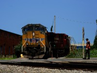 One of ten SD70ACe-T4 on lease to CPKC, UP 3078 is temporarily leading as it advances over a crossing just outside of Lachine IMS Yard. It is about to pick up rear DP CP 7025 before the power of CPKC 112 heads to St-Luc Yard.