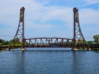 GIO's only job working the Welland area on this day is seen crossing bridge 17 as they return to Feeder after working Verbio and SLM Recycling.  Foamers and local residents will be happy to know that the vantage point for this shot, the Forks Road bridge, is finally complete, after the original bridge was closed in late 2018.  The $13.8 million project finally gives Dain City residents more than one route in or out of the peninsula south of Verbio, and was a cost share project between municipal, provincial, and Federal governments, with a portion covered by developer, Empire Communities, who is building a subdivision east of the Verbio plant, and on the old John Deere plant property.