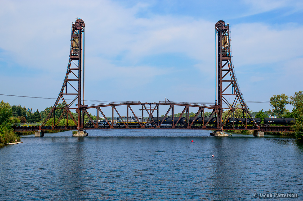 GIO's only job working the Welland area on this day is seen crossing bridge 17 as they return to Feeder after working Verbio and SLM Recycling.  Foamers and local residents will be happy to know that the vantage point for this shot, the Forks Road bridge, is finally complete, after the original bridge was closed in late 2018.  The $13.8 million project finally gives Dain City residents more than one route in or out of the peninsula south of Verbio, and was a cost share project between municipal, provincial, and Federal governments, with a portion covered by developer, Empire Communities, who is building a subdivision east of the Verbio plant, and on the old John Deere plant property.