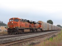 We got a text that CPKC 137 was on the way, so out we went to check out a location to photograph it. We went to Mountsberg first but the tall weeds had taken over and I wouldn't be able to shoot over them. Off we went to Guelph Junction to wait it out. We met another railfan who told us it was a double BNSF. He was correct. After a few minutes BNSF 7833 with BNSF 6375 slowly powered their way through Guelph Junction headed west.