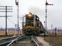 After meeting <a href=https://www.railpictures.ca/?attachment_id=54452>Extra 4050 west</a> at Guelph Junction, extra 8027 west splits the semaphores at Killean.

<br><br><i>Scan and editing by Jacob Patterson.</i>