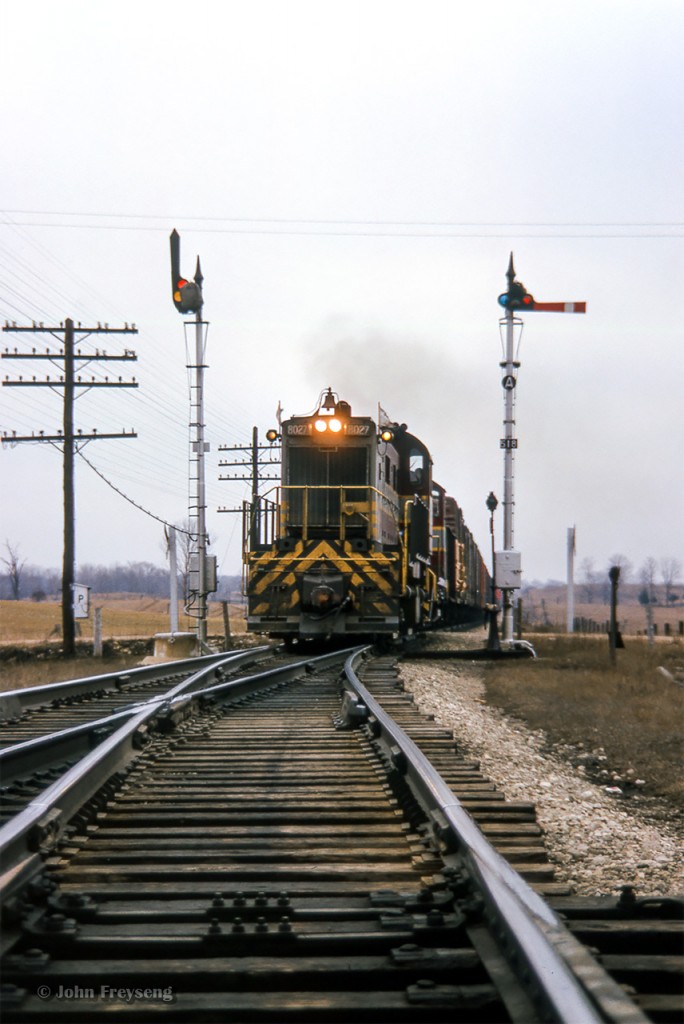 After meeting Extra 4050 west at Guelph Junction, extra 8027 west splits the semaphores at Killean.

Scan and editing by Jacob Patterson.