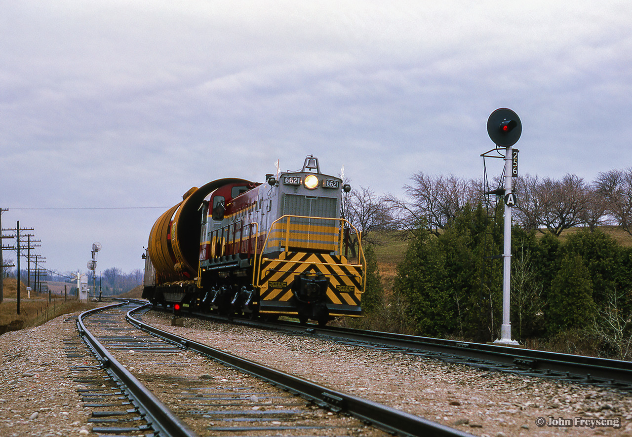 CPR 6621 takes a dimensional movement north from Toronto to Mactier, holding the main at Humber.  A station was located here until demolition in 1963, barely a year after the last train paused here.Scan and editing by Jacob Patterson.