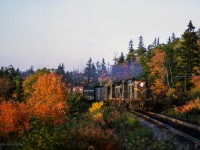 Tri-weekly Yarmouth - Halifax mixed train M244 behind a pair of MLW RSC13s approaches East River. Around two hours remains of the eleven-hour journey.

<br><br><i>Scan and editing by Jacob Patterson.</i>