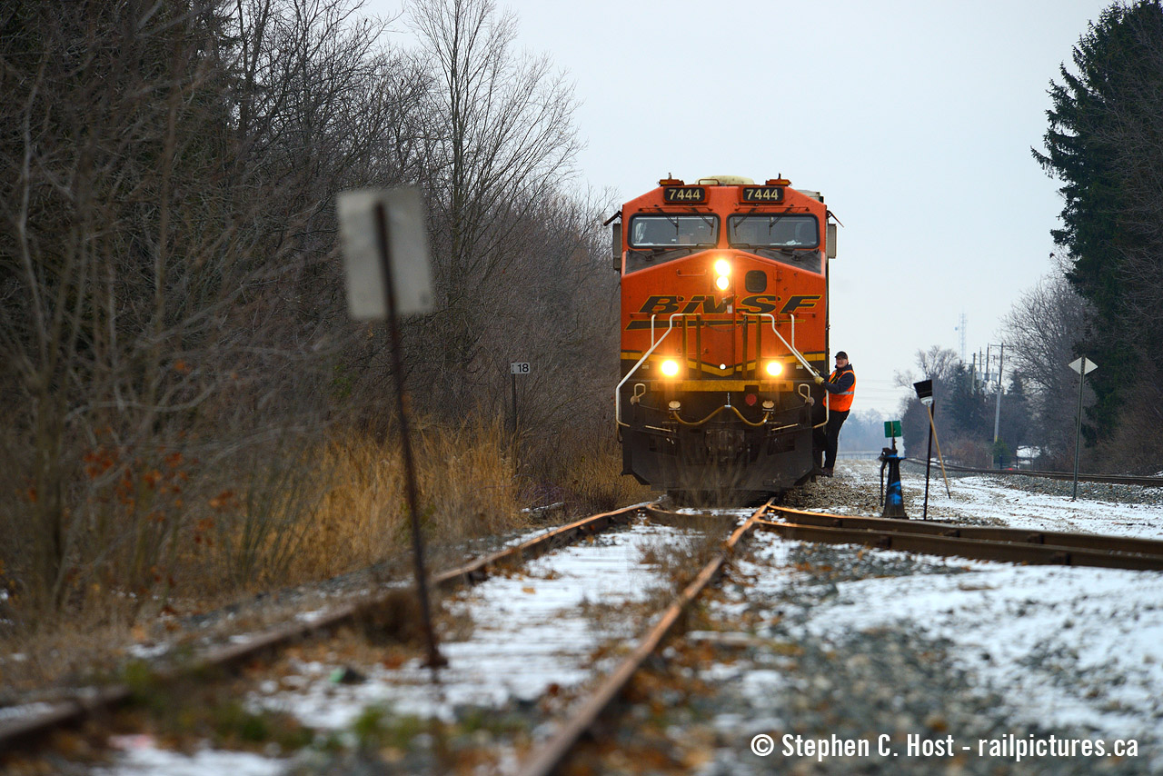 CP Train 244 is finishing their setoff at what was once Mile 18 of the CN Fergus Subdivision, leased to CP from Concession St to Hespeler Ave. A CN mile sign in the bushes marks the spot. A red flag in the middle of the track marks the Fergus north of here out of service since the GEXR days. Eagle St to Concession St (pictured here) will be ripped up soon once the CN / Canadian Transportation Agency discontinuance process has completed. CN already ripped out two crossings mind you. 244 will return south down the CP Waterloo Subdivision back to the Galt sub with a single boxcar before heading east to Toronto Yard.