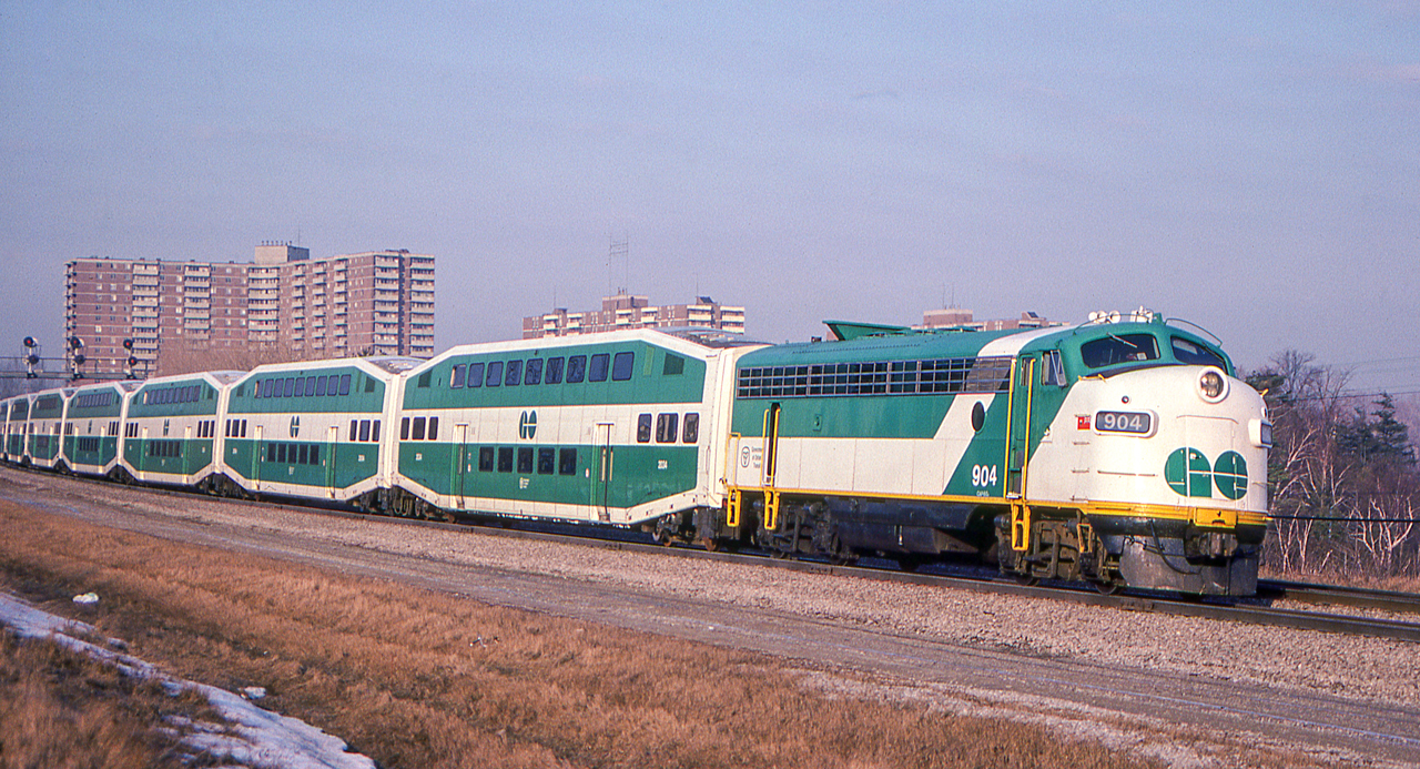 GO 904 and her train are in Scarborough, Ontario on March 24, 1982.