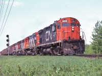 <br>
<br>
Fast Freight
<br>
<br>
the C-424 way
<br>
<br>
Note: white markers & flags, near Newtonville, May 27, 1979 Kodachrome by S.Danko
<br>
<br>
Noteworthy: not a GE in sight !
