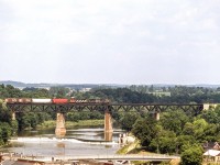 An eastbound CN freight is crossing the Grand River in Paris, Ontario on August 14, 1982.