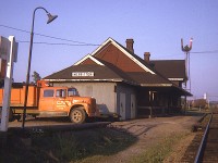 Here's another old image from the station files.  This is looking east on the Grimsby sub at Merritton. Note in the background the trestle connecting the Thorold sub is still in place. It was removed @ 1976, and the yard, of course is now gone. Station burned down in 1994, some 20 years after this image was shot..