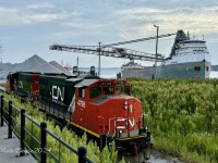 Having dropped a cut of cars at the Cargill Elevator, CN 4798 with CN 4770 head back to CN Sarnia yard along the Point Edward Spur while the 71 year old, 1953 built SAGINAW shifts unloading positions at the City Dock in Sarnia, ON.