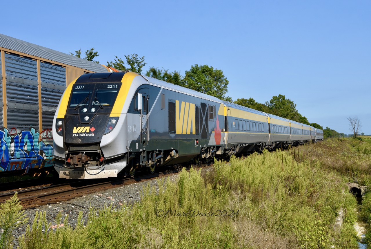 To the best of my knowledge every new VIA Siemens GenSet has passed through Sarnia, ON., eastbound on the Strathroy Sub. Yesterday, September 3, 2024, VIA 2211/2311 operating as VIA 331 did a test run along the aforementioned sub terminating in Sarnia. Here we see her at Brigden Side Road over taking train 301. Upon arrival the train was wyed and the crew was off for required rest and then back on duty around 01:30 to take the train operating as VIA 334 back eastbound.