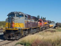 CP 7019, 5766, and KCS 4685 make for an interesting set of power to find on a work train. The interesting trio is nosed into the old elevator track at Ernfold. 