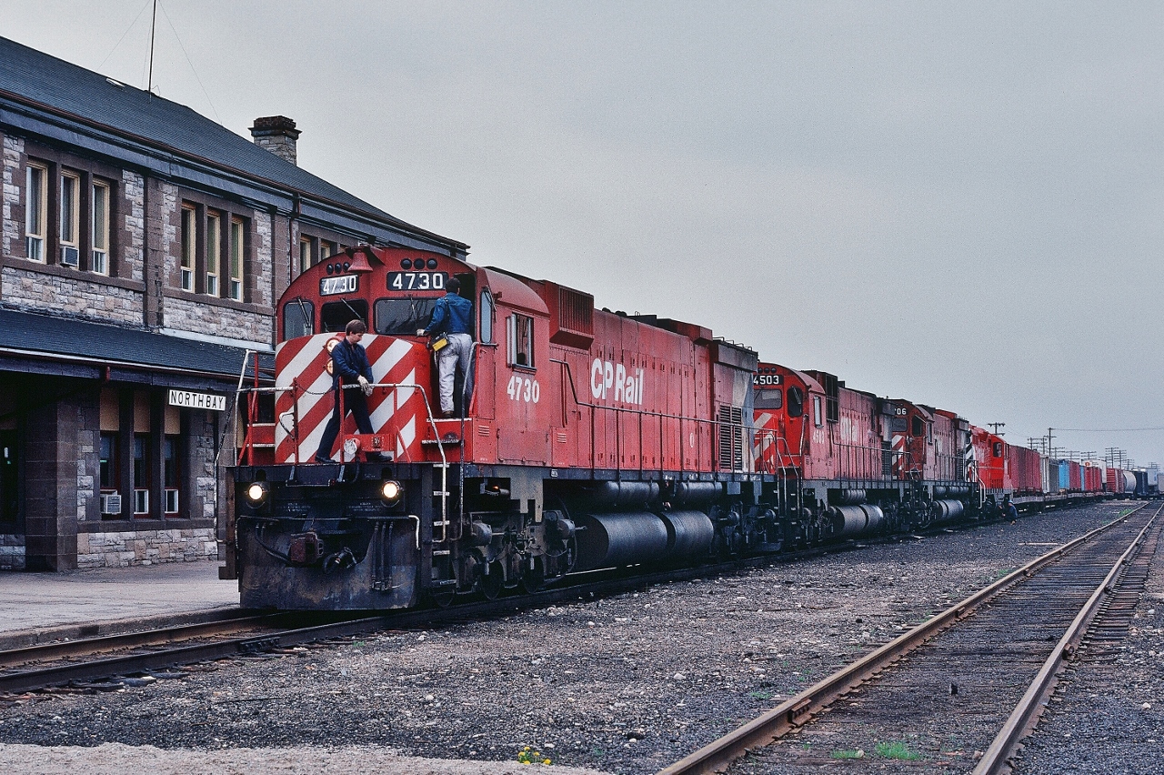 Crew Change


CP Rail #481 with MLW M-636 / C-630M / M-636 :  #4730 - 4503  - 4706 plus in tow GMD GP9 #8820  with  COFC


At CP Rail North Bay, Mile 117.3 North Bay Sub., Mile 0.0 Cartier Sub., May 21 1983 Kodachrome by S.Danko


And present, May 21, 1983,  at the CP Rail North Bay engine house


CP Rail RS-18 #8741; RS-18u #1814 (to NBEC by 1993); RDC-1 #90 ( ex CPR  # 9069) ; MLW S-3 #6594 ; MLW S-2  #7094.


More North Bay


       extra east  


sdfourty